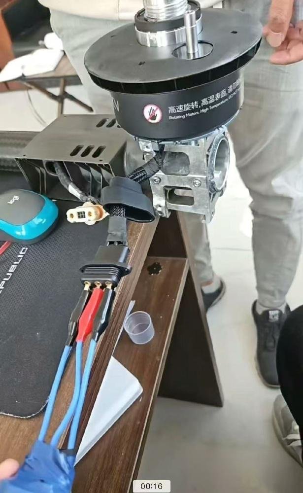 DJI Drone Motor Test Tool in repair workshop setup