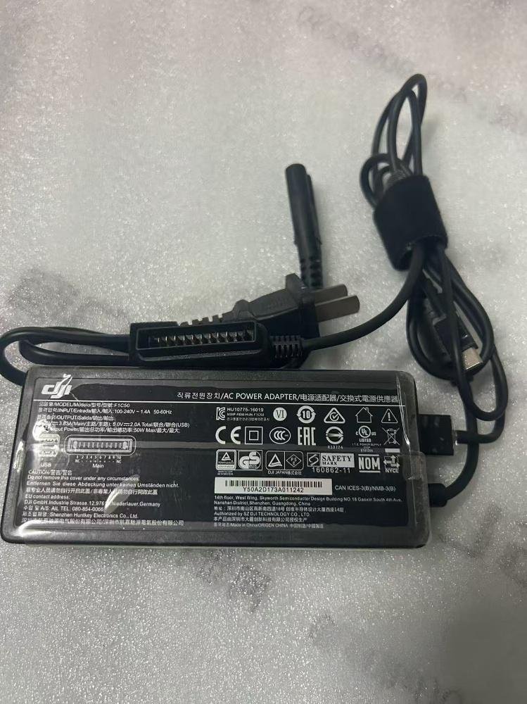 Label and port details of DJI F1C50 Battery Charger