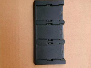 DJI Spark Battery Charging Hub and Charger Close-up Plug Title: DJI Spark Battery Charging Hub Detail