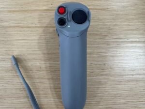 Close-up of DJI Motion Controller lanyard port and charging connector